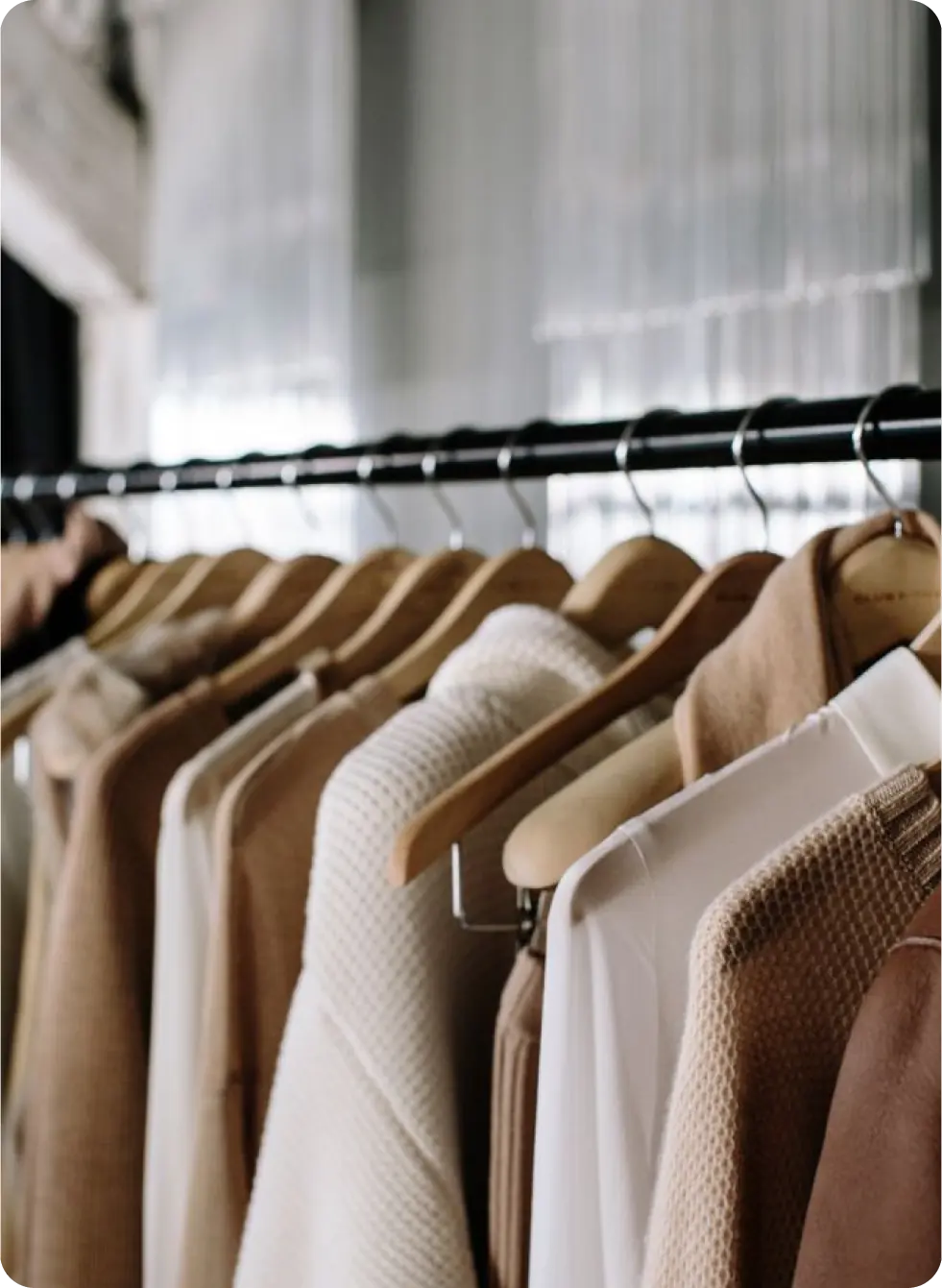Fashion apparel in warm neutral textiles